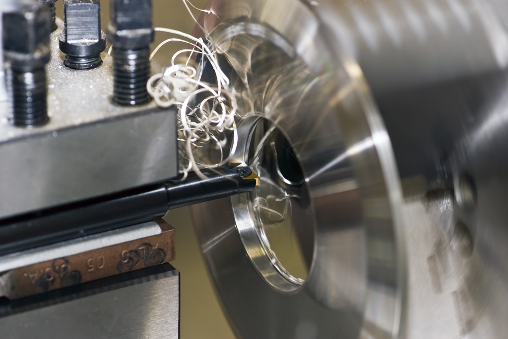 Close-up of metal spinning lathe